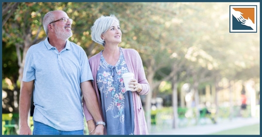 Older couple taking a walk outside